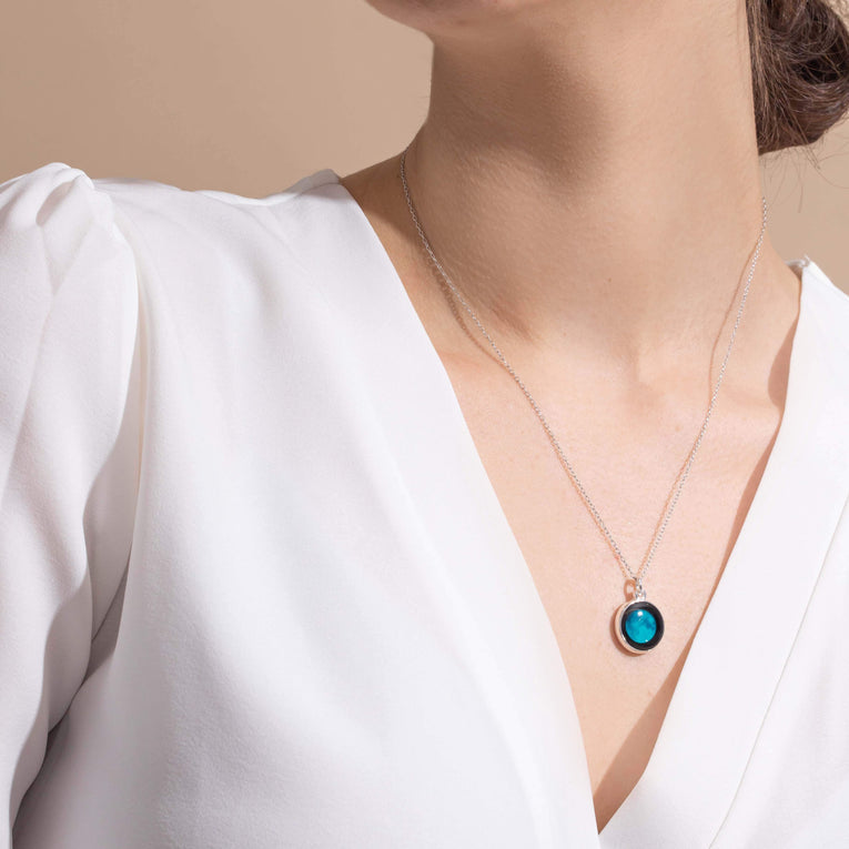 MOON CHARM NECKLACE